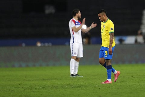 Brazil's Gabriel Jesus leaves the field after referee Patricio Loustau showed him the red card during a Copa America quarterfinal soccer match against Chile. (Photo | AP)