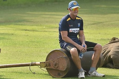 Sri Lanka’s batting coach Grant Flower sits on a roller during team's practice session (Photo | AP)
