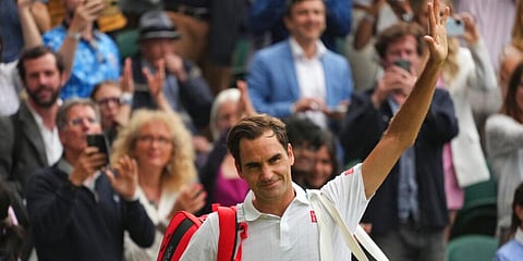 Roger Federer leaves the court after losing to Hubert Hurkacz during Wimbledon men's singles quarterfinals. (Photo | AP)