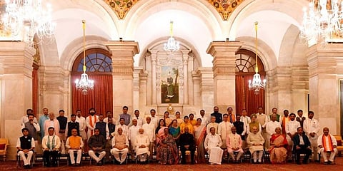 President Ram Nath Kovind, 1st Lady Savita, Vice President M Venkaiah Naidu, PM Narendra Modi and LS Speaker Om Birla in a group photograph with the newly sworn-in Council of Ministers. (Photo | PTI)