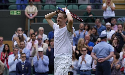 Canada's Denis Shapovalov celebrates after defeating Russia's Karen Khachanov during the men's singles quarterfinals match on day nine of the Wimbledon. (Photo | AP)