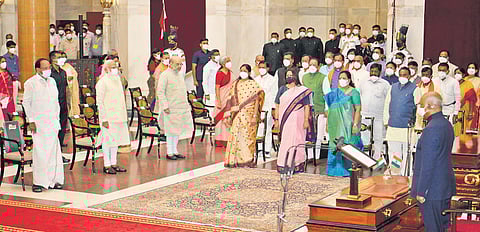 President Ram Nath Kovind (right) and Prime Minister Narendra Modi with the newly-inducted ministers at Rashtrapati Bhavan