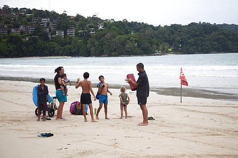 In this Wednesday, July 7, 2021, photo, tourist Liron Or, second from left, from Israel, and her family enjoy their vacation on Patong Beach Phuket, southern Thailand. (Photo | AP)