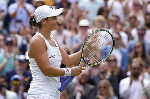 Australia's Ashleigh Barty celebrates after defeating Germany's Angelique Kerber during the women's singles semifinals match on day ten of the Wimbledon. (Photo | AP)