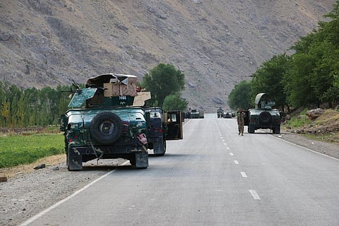 Afghan soldiers pause on a road at the front line of fighting between Taliban and Security forces, near the city of Badakhshan, northern Afghanistan, Sunday, July. 4, 2021. (Photo | AP)