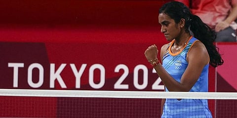 India's PV Sindhu plays a shot during her women's singles badminton bronze medal match against Chinas He Bingjiao, at the 2020 Summer Olympics in Tokyo. (Photo | ANI)