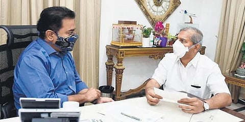 MLA Ch Ramesh Babu with MAUD Minister KT Rama Rao during a meeting on Vemulawada development works in Hyderabad on Tuesday, August 10, 2021. (Photo | Express)