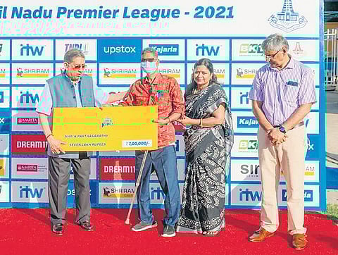 K Parthasarathy, the former groundsman at the MA Chidambaram Stadium receives a cheque of `7 lakh, a one-time benefit fund from Chennai Super Kings. N Srinivasan, the former BCCI president gave away t