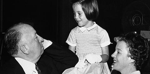 Alfred Hitchcock appears with his eldest granddaughter, six-year old Mary O'Connell, when she appears with her mother, actress Pat Hitchcock, right. (Photo | AP)