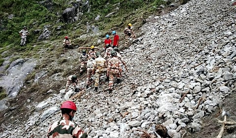 Rescue work in progress after a massive landslide at Nigulsari Reckong-Peo-Shimla National Highway in Kinnaur district. (Photo | Twitter)