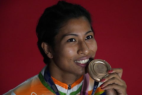 India's Lovlina Borgohain with the bronze medal. (File Photo | AP)
