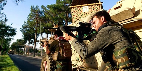 Afghan security personnel take a position while fighting the Taliban. (File Photo | AP)