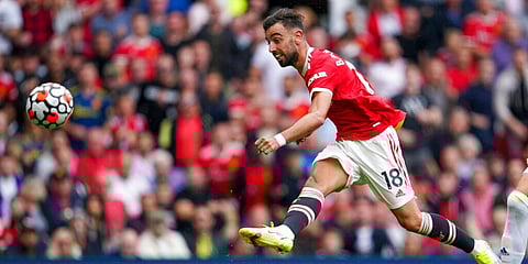 Manchester United's Bruno Fernandes scores his third goal during the English Premier League soccer match with Leeds United at Old Trafford in Manchester, England, August 14, 2021. (Photo | AP)