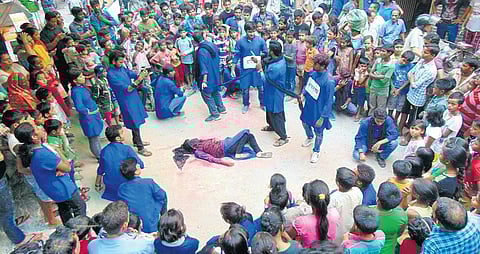 Pre-COVID days of Dramaturgy Theatre Group doing a nukkad natak on Swachhta and Beti Bachao Beti Padhao outside Saket metro station. (Photo| EPS)