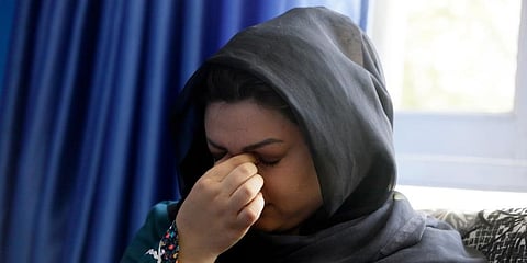 Women's rights activist Zarmina Kakar cries during an interview in Kabul, Afghanistan. (Photo | AP)