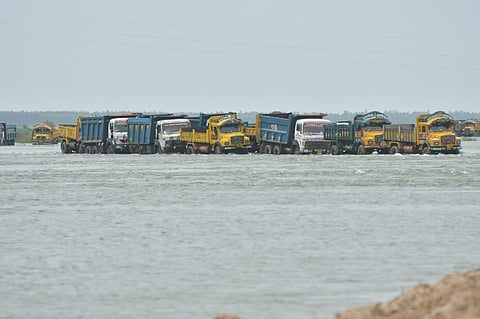 The trucks stuck in the river (Photo | Special arrangement)