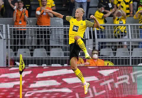 Dortmund's Erling Haaland celebrates after scoring his side's goal during Bundesliga match against Eintracht Frankfurt in Dortmund, Germany, Aug. 14, 2021. (Photo | AP)