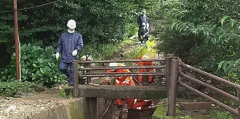 Rescue members search for missing people following heavy rain in an area in Unzen, Nagasaki prefecture, southern Japan, Sunday, Aug. 15, 2021. (Photo | AP)