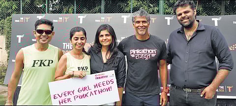 Trial Box founders Sumedha and Gaurav Mehta (both in blck shirts) at a Pink Marathon.