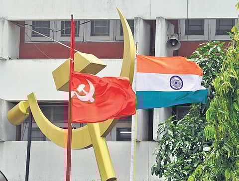 The national flag hoisted next to the CPM flag in front of AKG Centre in Thiruvananthapuram. (Photo| BP Deepu, EPS)