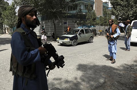 Taliban fighters stand guard at a checkpoint in the Wazir Akbar Khan neighborhood in the city of Kabul, Afghanistan. (Photo | AP)