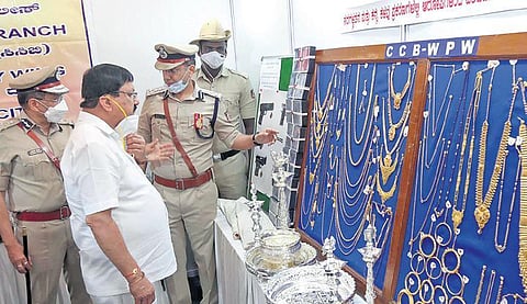 Home Minister Araga Jnanendra inspects recovered property at the CAR Parade Grounds in Bengaluru on Wednesday | vinod kumar t