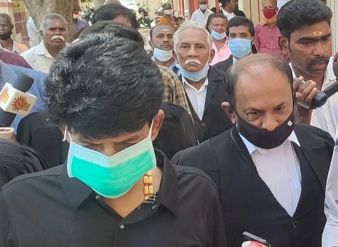 Director Bala (L) outside the court.