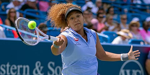 Naomi Osaka hits the ball to Cori Gauff during the Western & Southern Open tennis tournament at the Lindner Family Tennis Center in Mason, Ohio. (Photo | AP)