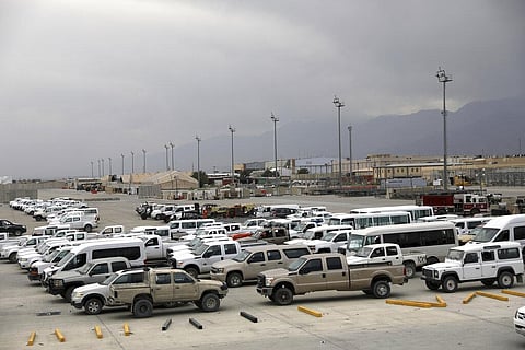 Vehicles are parked at Bagram Airfield after the American military left the base, in Parwan province north of Kabul, Afghanistan. (Photo | AP)