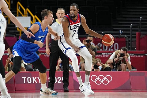 United States's Kevin Durant (7) works the ball against Czech Republic's Jan Vesely (24) during a men's basketball preliminary round game. (Photo | AP)