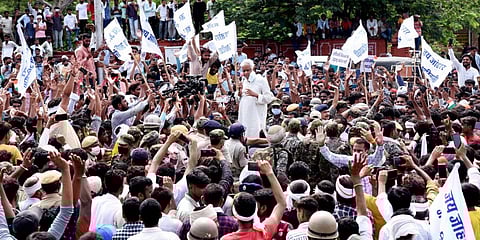 Rajya Sabha MP Kirodi Lal Meena addresses Aadiwasi Meena Samaj supporters at Gandhi Circle in Jaipur. (Photo| PTI)