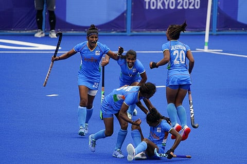 Team India celebrates after winning their women's field hockey match against Australia at the 2020 Summer Olympics. (Photo | AP)