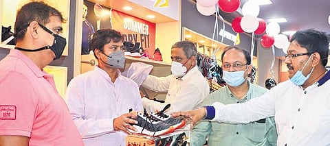 Dilip Tirkey inaugurating the Impakto store at Patia. (Photo | Express)