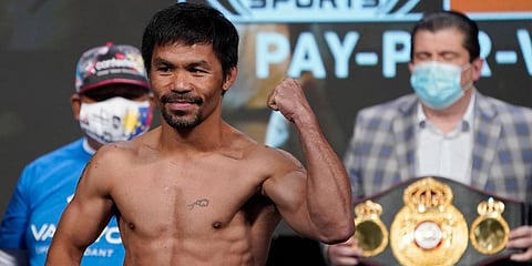 Manny Pacquiao, of the Philippines, poses for photographers during a weigh-in Friday, August 20, 2021, in Las Vegas. (Photo | AP)