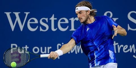 Stefanos Tsitsipas returns to Felix Auger-Aliassime during the Western & Southern Open tennis tournament in Mason, Ohio. (Photo | AP)