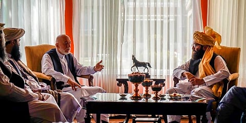 Former Afghan President Hamid Karzai, center left, senior Haqqani group leader Anas Haqqani, right, meet in Kabul. (File Photo | AP)