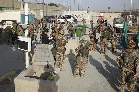 Members of the British and US military engage in the evacuation of people out of Kabul, Afghanistan (Photo | AP)