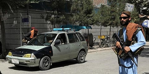 Taliban fighters stand guard at a checkpoint in the Wazir Akbar Khan neighborhood in the city of Kabul, Afghanistan. (Photo | AP)