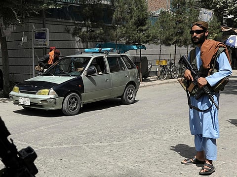 Taliban fighters stand guard at a checkpoint in the Wazir Akbar Khan neighborhood in the city of Kabul, Afghanistan. (Photo | AP)