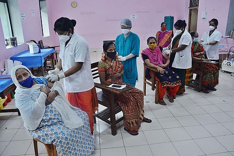 Health workers administer Covid vaccine to women during a special drive in Thane, Maharashtra. (Photo | PTI)
