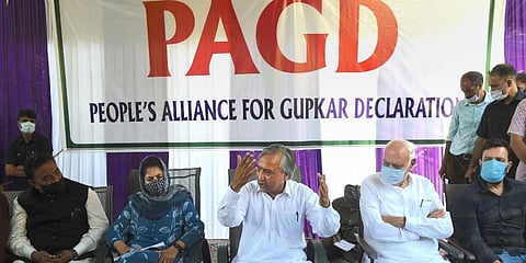 People's Alliance for Gupkar Declaration (PAGD) Spokesman M Y Tarigami with other leaders addressing a press conference after a meeting, in Srinagar on Tuesday. (Photo | PTI)