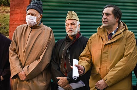 Spokesperson of Peoples Alliance for Gupkar Declaration PAGD Sajad Gani Lone (3R) addresses media persons. (Photo | PTI)