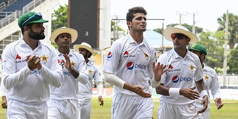 Shaheen Afridi (second ringt)of Pakistan walk off the field at the lunch break during day 4 of the 2nd Test between West Indies and Pakistan at Sabina Park, Kingston. (Photo | AFP)