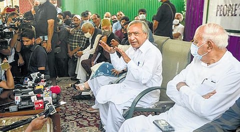 Leaders of the six-party Gupkar Alliance during a joint press conference in Srinagar on Tuesday. (Photo | PTI)