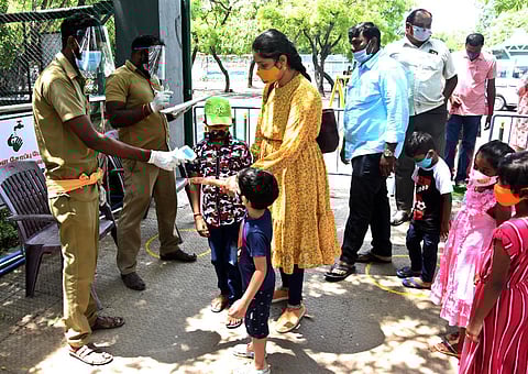 Thermal checks being done for visitors as the Vandalur Zoo reopened for the public from Wednesday after the relaxation of the lockdown (Express Photo | Ashwin Prasath)