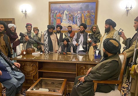Taliban at the Afghan presidential palace in Kabul. (Photo | AP)