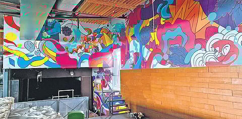 Abhedya’s art on the walls of the soon-to-be-opened pub, Greese Monkey.