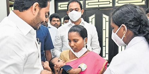 Pneumococcal Conjugate Vaccine being given to a month-old baby in the presence of CM YS Jagan Mohan Reddy at his camp office in Tadepalli. (Photo I EPS)