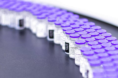 In this March 2021 photo provided by Pfizer, vials of the Pfizer-BioNTech COVID-19 vaccine are prepared for packaging. (Photo | AP)