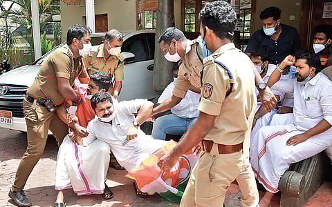Police arrest Youth Congress activists who gheraoed P Pradeep, NHAI project director, at his office in Pettah near Palkulangara on Friday | B P Deepu